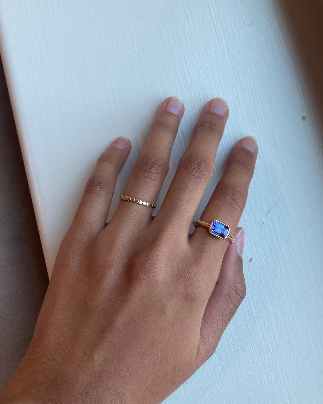 14k Tanzanite Ring with a Diamond Dotted Band - Emerald Cut