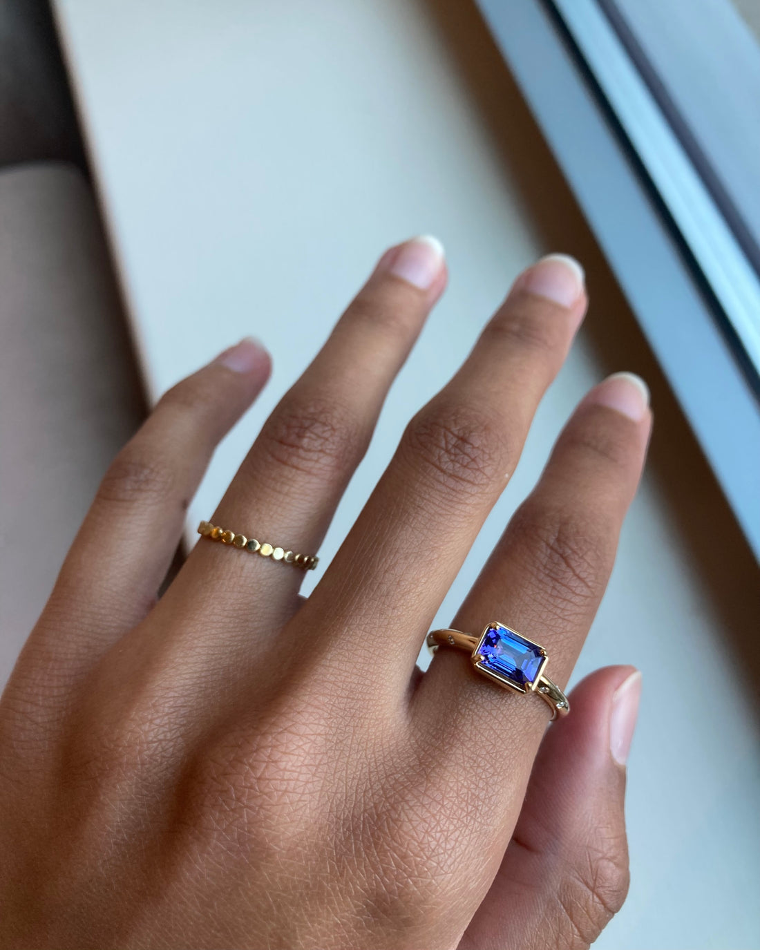 14k Tanzanite Ring with a Diamond Dotted Band - Emerald Cut