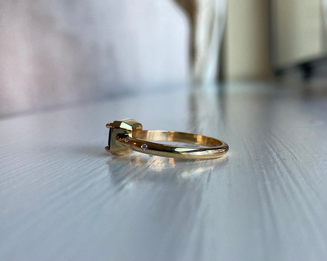 14k Tanzanite Ring with a Diamond Dotted Band - Emerald Cut