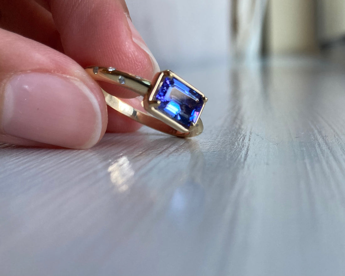 14k Tanzanite Ring with a Diamond Dotted Band - Emerald Cut