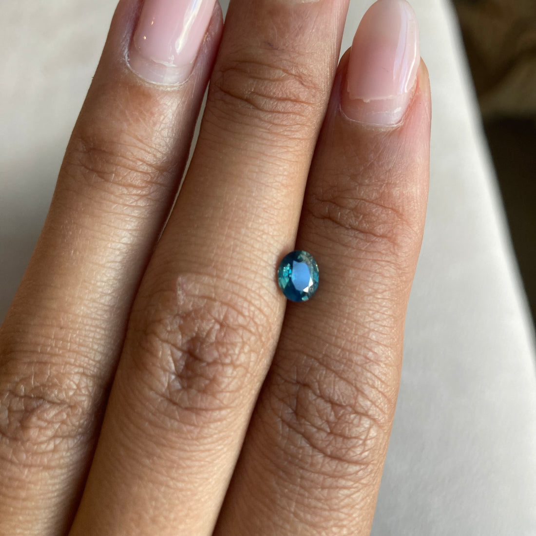0.65 ct Opalescent Teal Sapphire