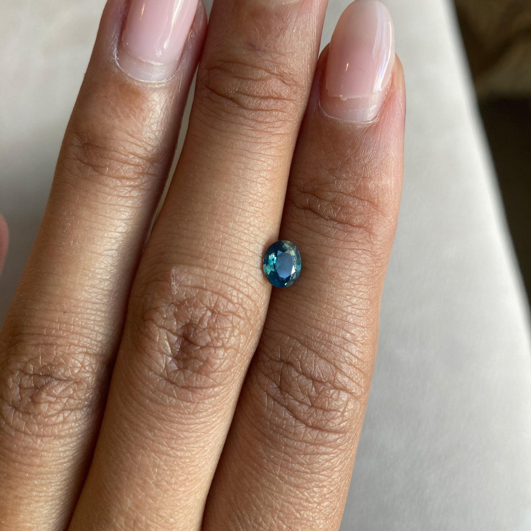 0.65 ct Opalescent Teal Sapphire