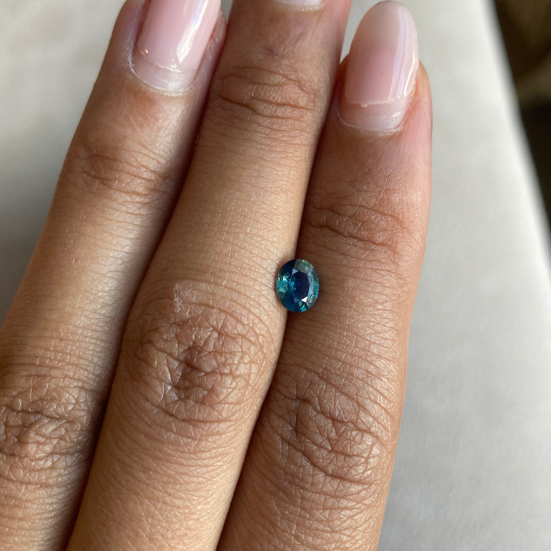 0.65 ct Opalescent Teal Sapphire