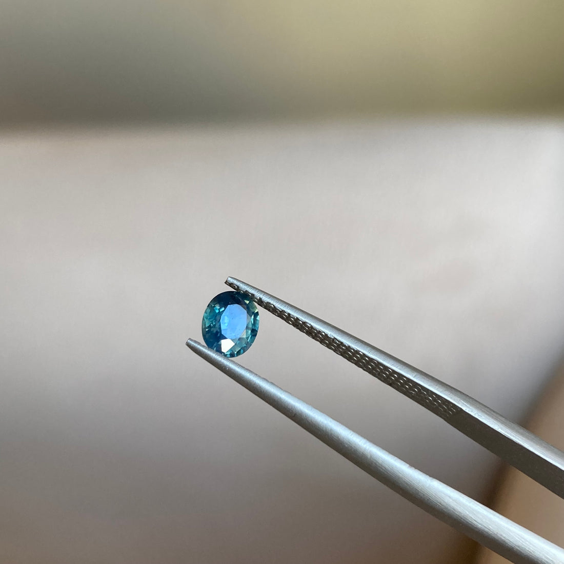 0.65 ct Opalescent Teal Sapphire