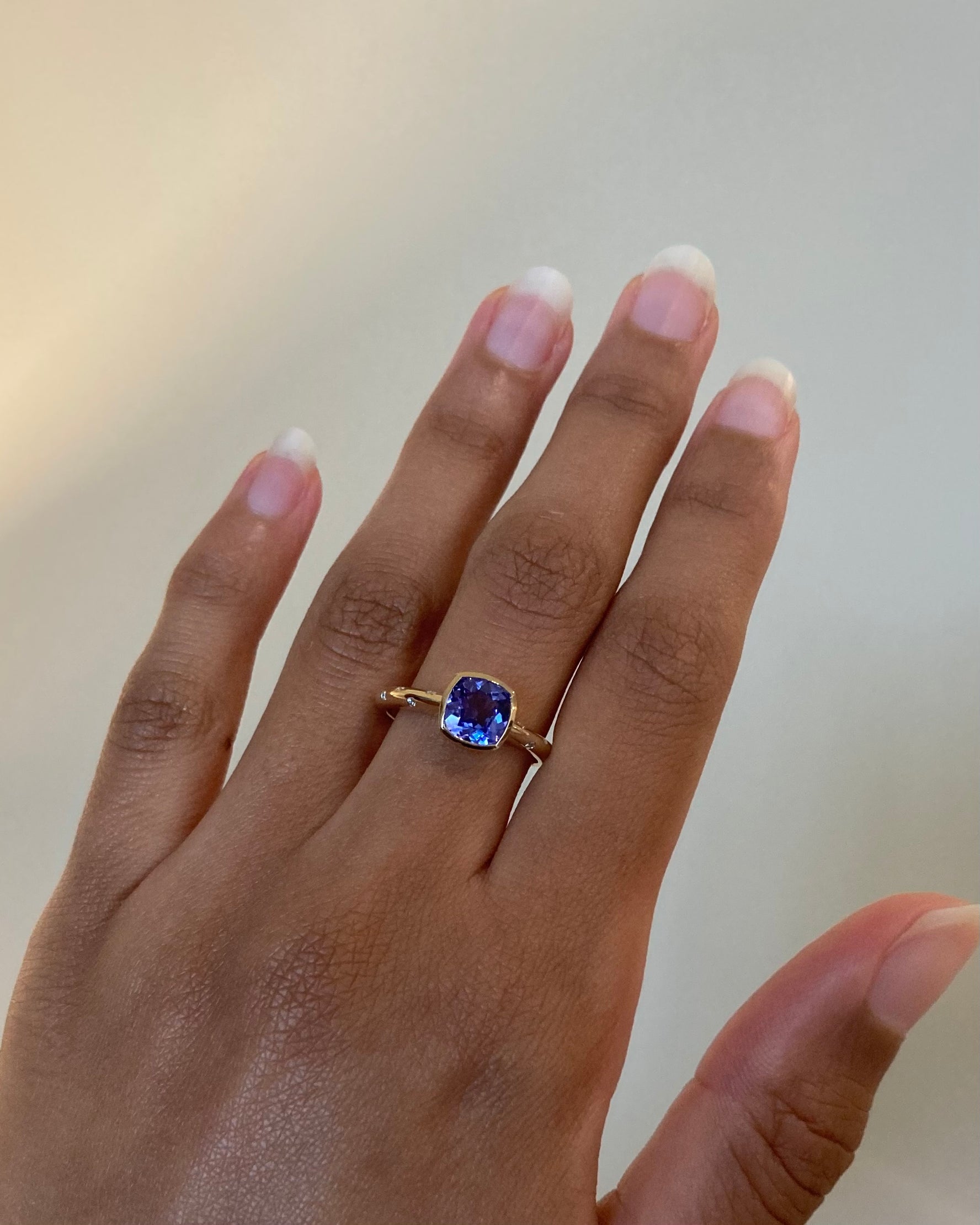 14k Tanzanite Ring with a Diamond Dotted Band - Cushion Cut